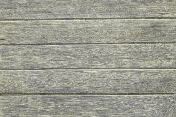 Grey color brown color wooden plank background.