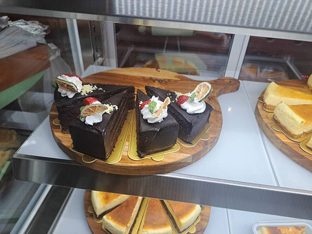 Devil Choco Cake with premium dark cocoa, strawberry, dried lemon slices, mint leaves and a sprinkle of white chocolate. Dessert Menu.