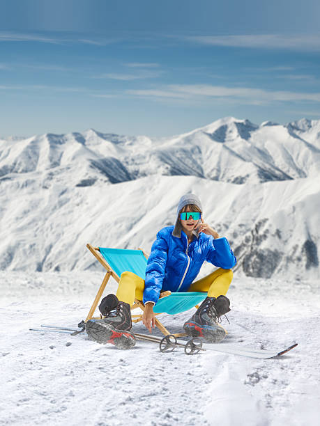 Digital poster with relaxed skier resting on deck chair in snow. Concept of winter leisure, slow lifestyle trends, premium travel branding, balanced comfort, and visual pause.