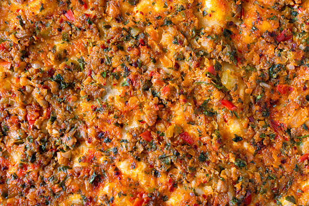 Big size lahmacun on black stone background