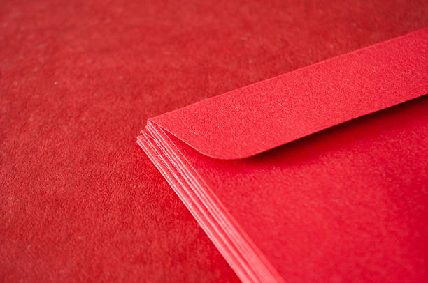 Minimal red envelope corner detail emphasizing festive color and cultural tradition