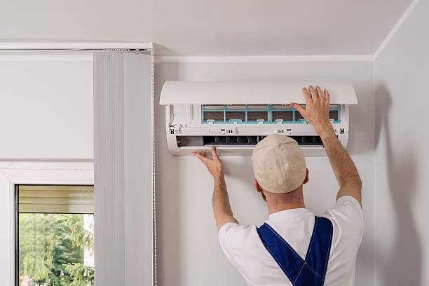 Zone Cool Comfort Expert Performing In-Depth Internal Maintenance on Residential Air Handling Systems