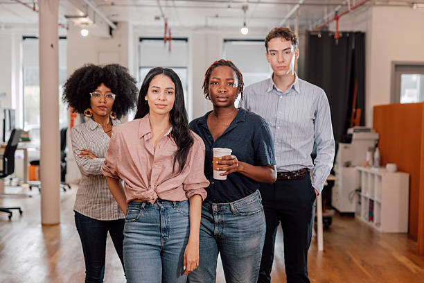 istock Confident diverse business team standing together in office 2255917319