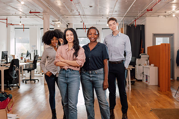 istock Confident diverse business team standing together in office 2255917357