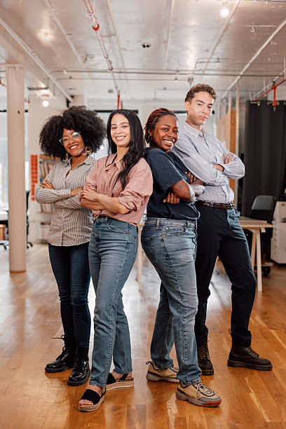 istock Confident diverse business team standing together in office 2255917381