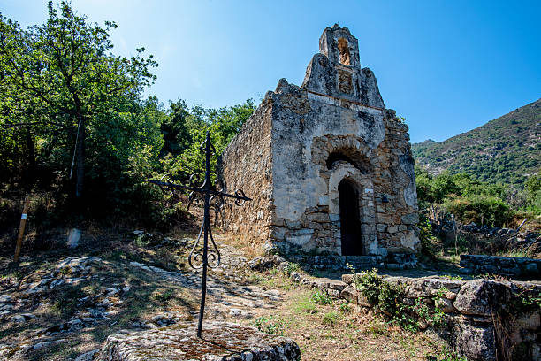 Old stone pathway leading to a secluded chapel in the hills near Corte, Corsica, France. A quiet Mediterranean scene expressing timelessness, heritage and connection between landscape and culture.