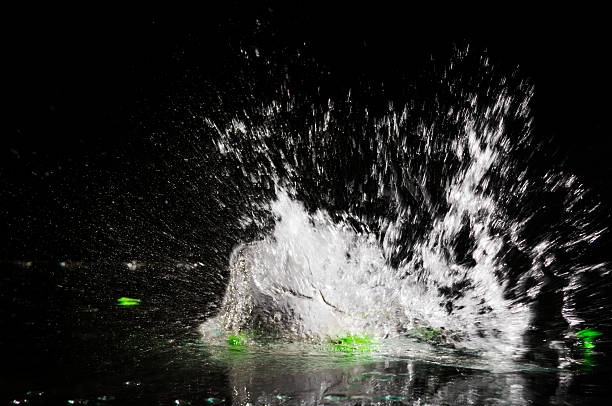 Tennis ball floats in outdoor swimming pool