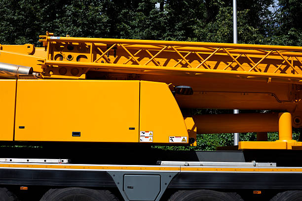 Moscow, Russia, August 6, 2025: Side view of the Liebherr 1130 turret slewing mechanism with lifting capacity of over 100 tons. The crane is folded for transportation