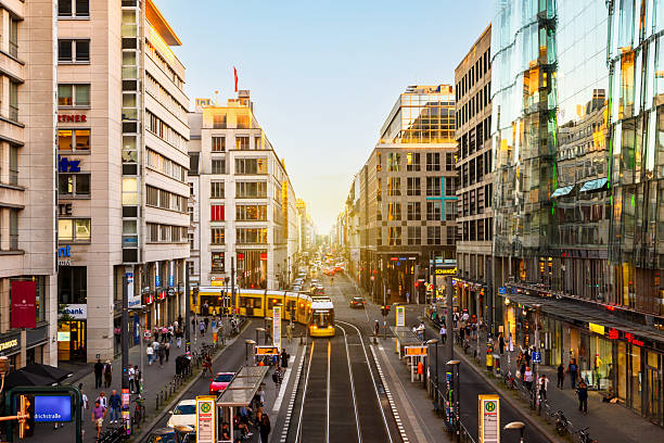 istock yellow streetcar on Berlin Friedrichstrasse at sunset hour 2255925875