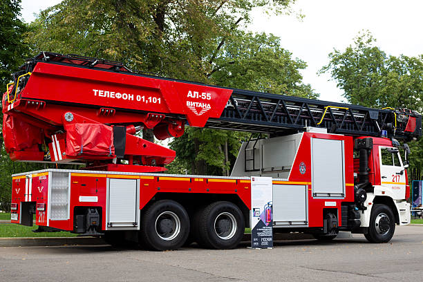 Moscow, Russia, August 6, 2025: Large ladder truck of fire engine based on Kamaz. Extinguishing skyscraper fires at very high altitudes. Truck crane at exhibition of special equipment in Moscow