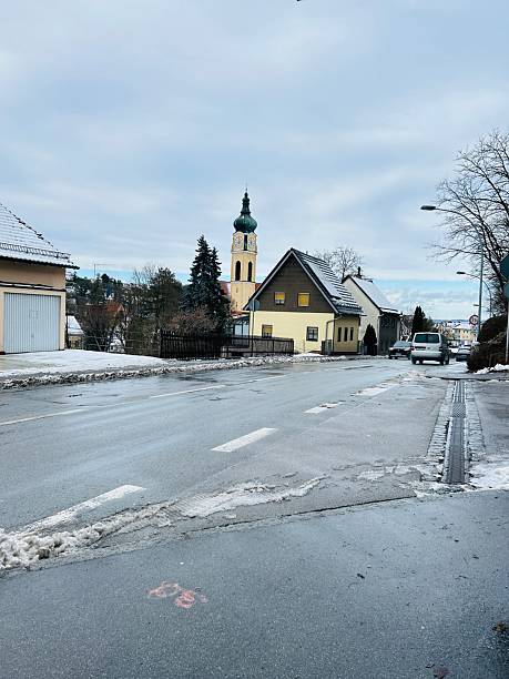istock Snowy Road In Urban Area 2255926120