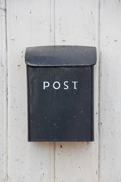 istock mailbox on a wooden fence 2255930989