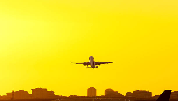 istock Airplane silhouette at sunset. Business trip 2255935081
