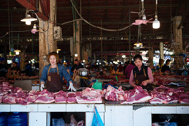 Pai, Vietnam - May, 7, 2024: Meat market stall in Pai. Fresh food is produced locally, keeping the economy running. Market stalls can be found all around Vietnam.