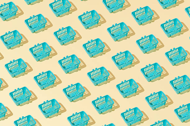 istock Creative grocery basket cart pattern flat lay on yellow background minimalism 2255962274