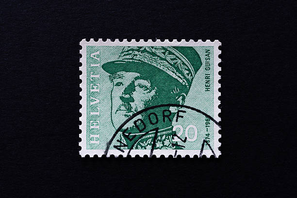 Postage stamps.Collection of stamps and magnifying glass.A collection of world stamps in a pile.Philately.Postage stamps from different countries and times