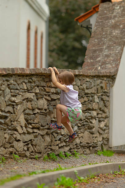 Portrait of little boy playing at a park
