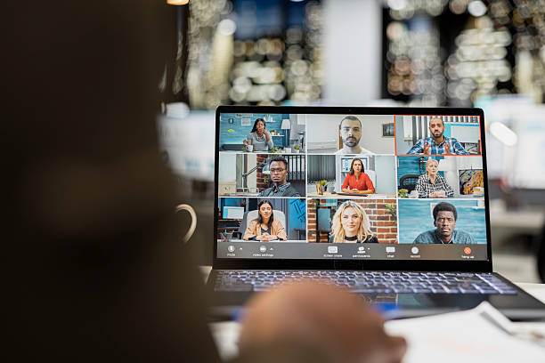 istock Black professional chatting on online video conference with shareholders 2255976010