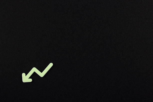 The dark background emphasizes the bright arrow. It is recommended as a graphic design material when you want to dramatically stage falling numbers or negative changes in status.
