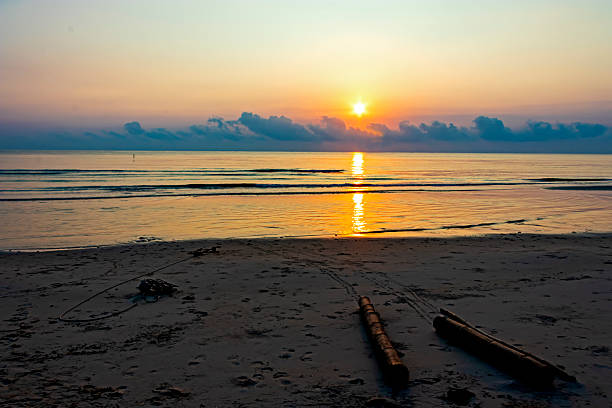 Sunrise and silhouette in morning on beach Ban Krut Beach, in Prachuap Khiri Khan Province Thailand is famous for travel.