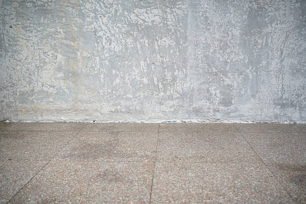 Weathered concrete walls and marble floors - Urban interior backdrop