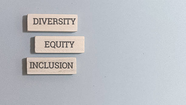 istock Diversity, equity, and inclusion wooden blocks on gray background 2256000372