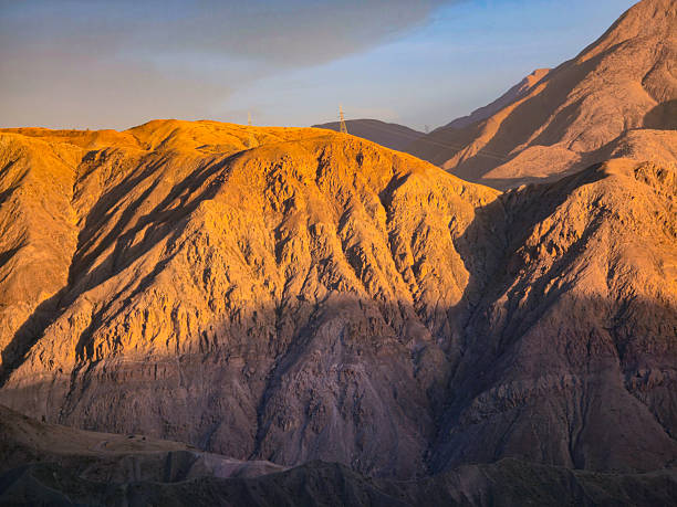 View of rocky desert mountains at sunset