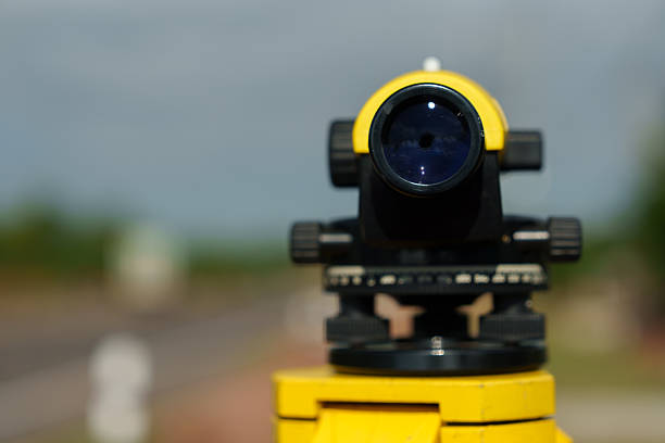 Instrument mounted tripod ensuring accurate land measurements practices in environmental industrial.