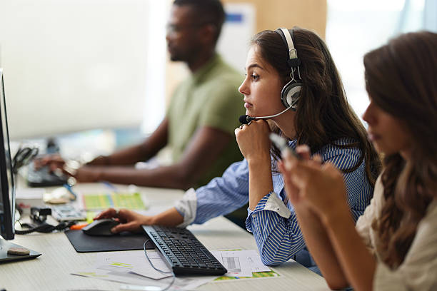 istock Female customer service representative working on PC in the office. 2256014046