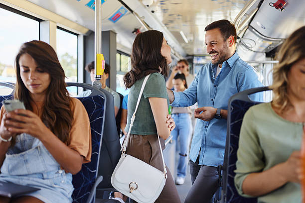 istock Happy couple talking while traveling by bus. 2256020230