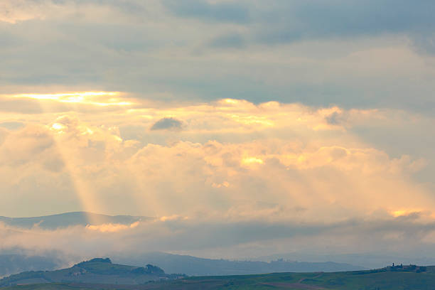 Sunset over the mountains with sunspots