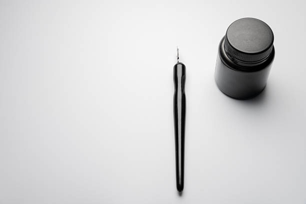 Collection background of pens and pencils on wooden surface. Conceptual image about the work tools of writers, journalist and graphic artists