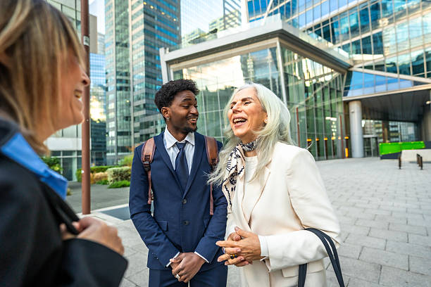 istock Diverse business professionals having a cheerful conversation outdoors 2256026324
