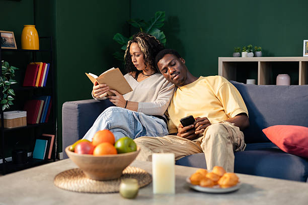 istock Diverse couple relaxing at home, enjoying quiet time 2256029854