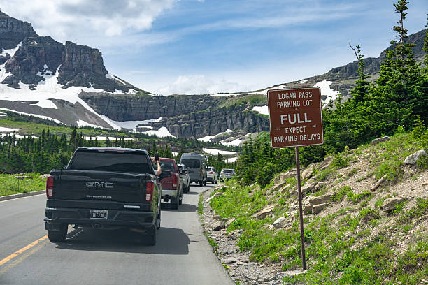 Clements Mountain and Going-To-The Sun road winding up to Logan Pass Visitor Center in Glacier National Park, Montana. Clements Mountain is located in the Lewis Range.