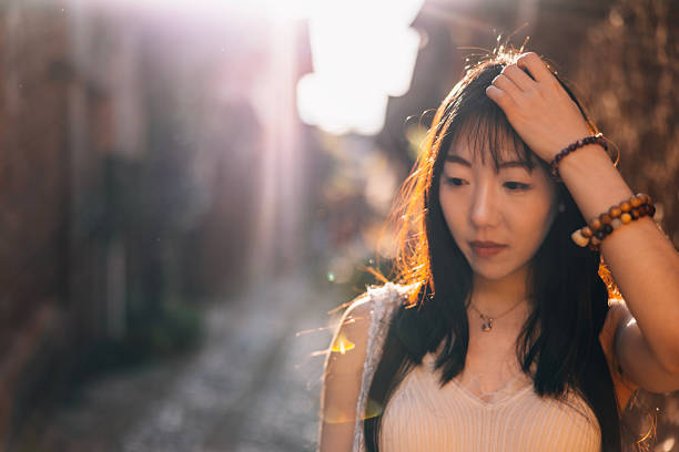 A girl traveling in the ancient town of Yunnan, China