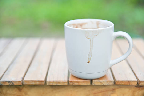 dirty coffee stain on  ceramic glass from drinking. stain for cleaning concept.