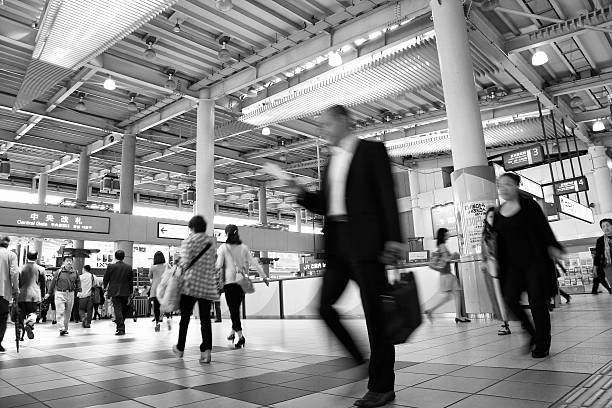 People hurry at Shinagawa Station on May 10, 2012 in Tokyo. 477,000 daily passengers used the station in 2011. It is one of the busiest stations in Tokyo.