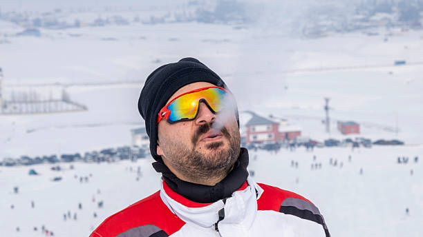ski lodge background, ski goggles, golden goggles, ultraviolet goggles, fleece beanie, balaclava, ski clothes, snowboard costume, snowboard clothes