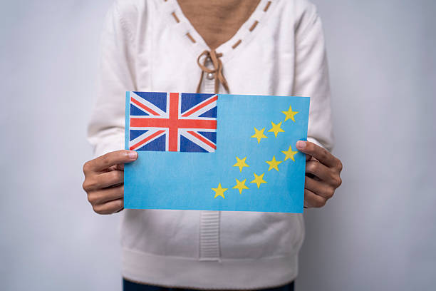 istock Hands Holding National Flag of Tuvalu 2256064953
