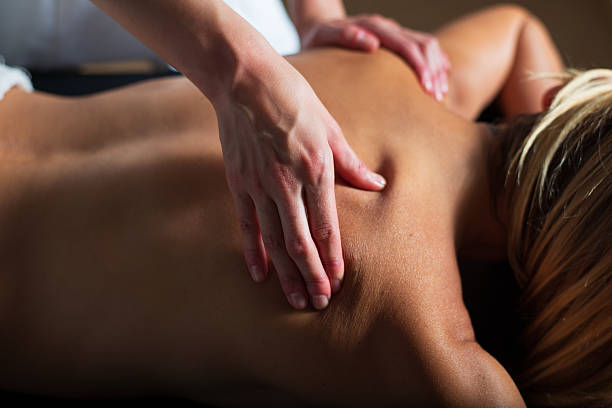 istock Young woman getting back massage in the massage salon 2256073173