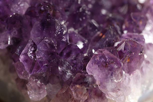 Aura. Beautiful amethyst as background, closeup view