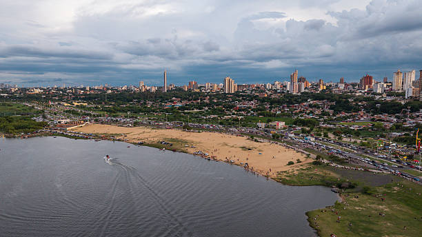 Sunset in an urban coastal area by the river - Asunción Bay, Playa de La Costanera - Asunción - Paraguay
