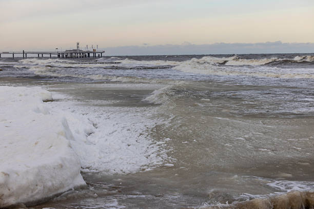 Storm at the pier in Koserow on the Baltic Sea, Usedom Island, Germany