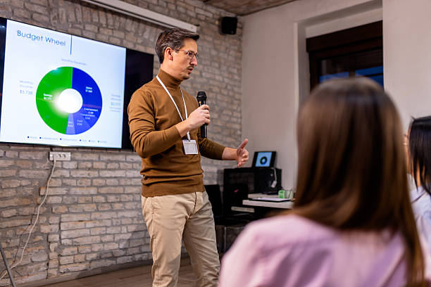 istock Businessman Leading Conference with Presentation 2256097565