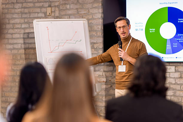 istock Businessman Leading Conference with Presentation 2256097895