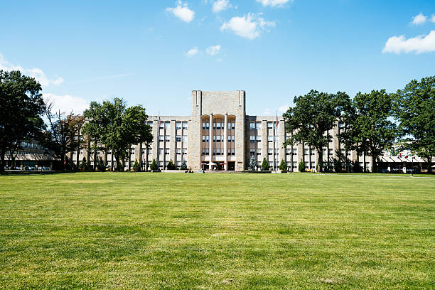 istock Large impressive univeersity building and campus on sunny day 2256108489