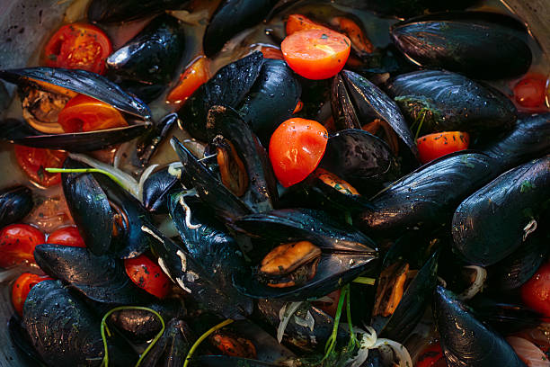 Mussels with tomato sauce, a classic fish starter.