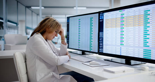 istock Stressed Nurse Struggling With Technology 2256112826