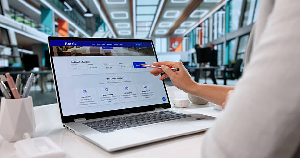 istock Woman Booking Hotel Online Using Laptop 2256113338